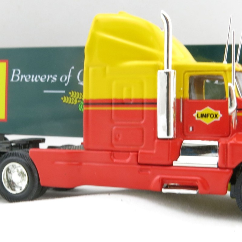P.E.M. - World Car Collectables Australian Kenworth T600 A LINFOX WITH XXXX Beer QLD Trailer - Scale 1:64