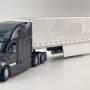 Diecast Masters 71047 - Freightliner Cascadia Truck Black with a White Cargo Trailer - Scale 1:50