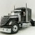 Diecast Masters 71023 - International LoneStar Sleeper Cab Truck Black - Scale 1:50