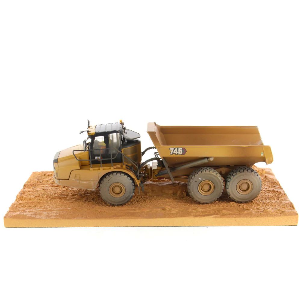 Diecast Masters 85704 - Caterpillar CAT 745 Articulated Truck Weathered Series - Scale 1:50