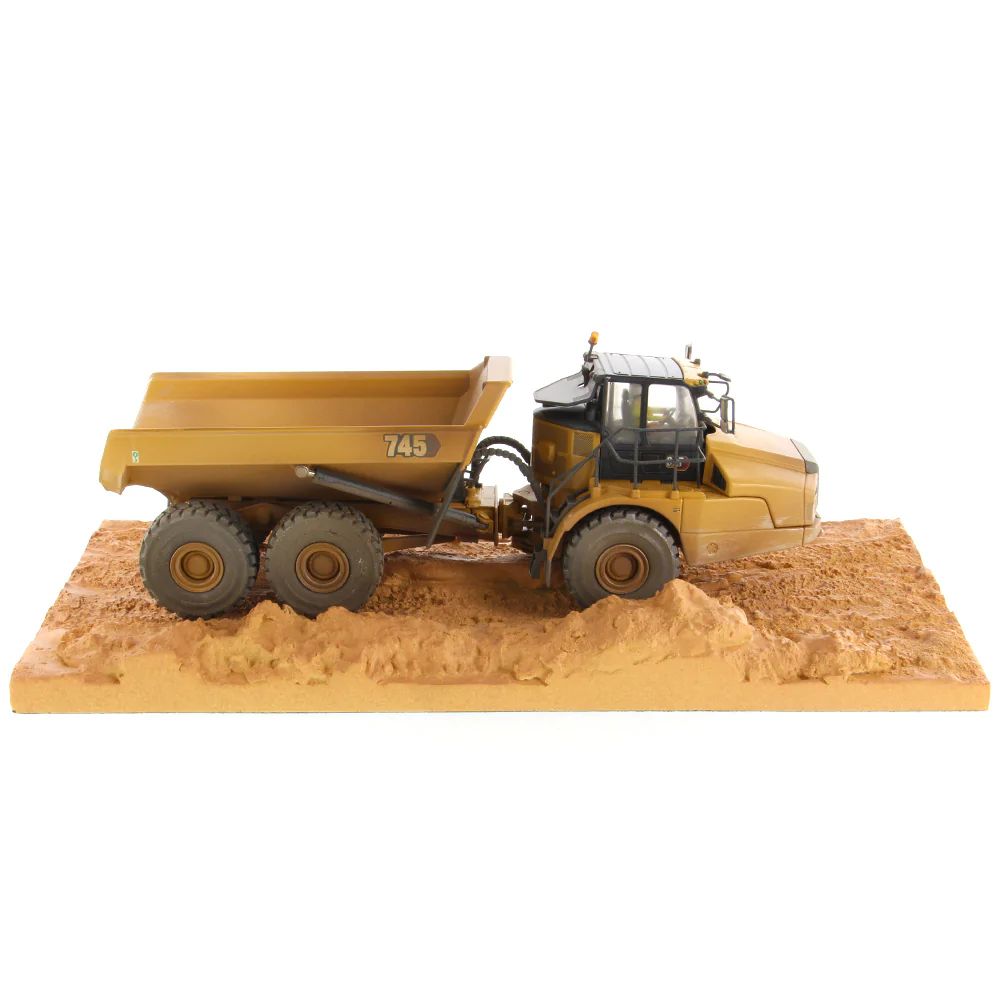 Diecast Masters 85704 - Caterpillar CAT 745 Articulated Truck Weathered Series - Scale 1:50