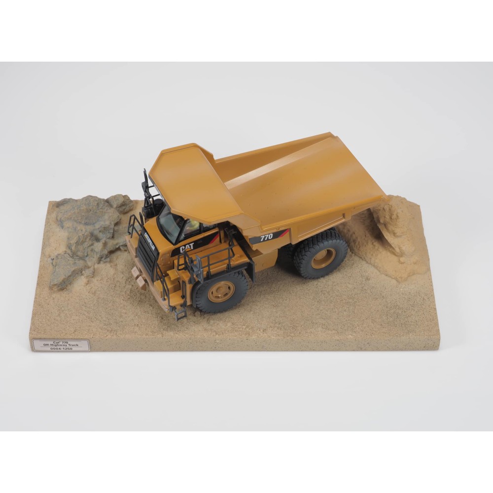 Diecast Masters 85756 - Caterpillar CAT 770 Off-Highway Truck Weathered Series - Scale 1:50