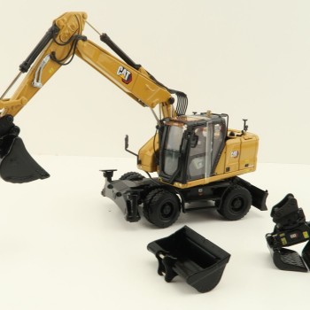 Diecast Masters 85956 - Caterpillar CAT M318 Wheeled Excavator & Attachments High Line - Scale 1:50