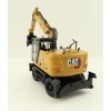 Diecast Masters 85956 - Caterpillar CAT M318 Wheeled Excavator & Attachments High Line - Scale 1:50