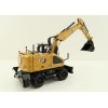 Diecast Masters 85956 - Caterpillar CAT M318 Wheeled Excavator & Attachments High Line - Scale 1:50