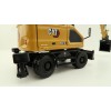 Diecast Masters 85956 - Caterpillar CAT M318 Wheeled Excavator & Attachments High Line - Scale 1:50