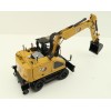Diecast Masters 85956 - Caterpillar CAT M318 Wheeled Excavator & Attachments High Line - Scale 1:50