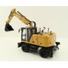 Diecast Masters 85956 - Caterpillar CAT M318 Wheeled Excavator & Attachments High Line - Scale 1:50