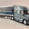 First Gear 50-3502 Volvo VNL 860 High-Roof Sleeper Truck with 53' Trailer with Skirts Coastal Mist 1:50 Scale