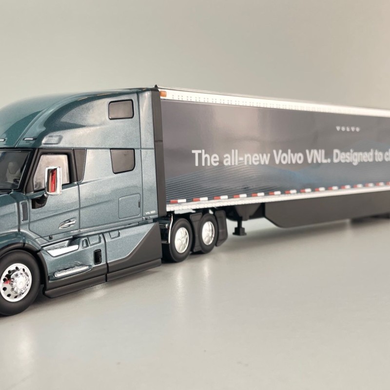 First Gear 50-3502 Volvo VNL 860 High-Roof Sleeper Truck with 53' Trailer with Skirts Coastal Mist 1:50 Scale