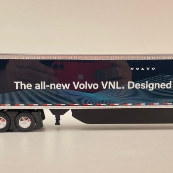First Gear 50-3502 Volvo VNL 860 High-Roof Sleeper Truck with 53' Trailer with Skirts Coastal Mist 1:50 Scale