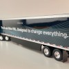 First Gear 50-3502 Volvo VNL 860 High-Roof Sleeper Truck with 53' Trailer with Skirts Coastal Mist 1:50 Scale
