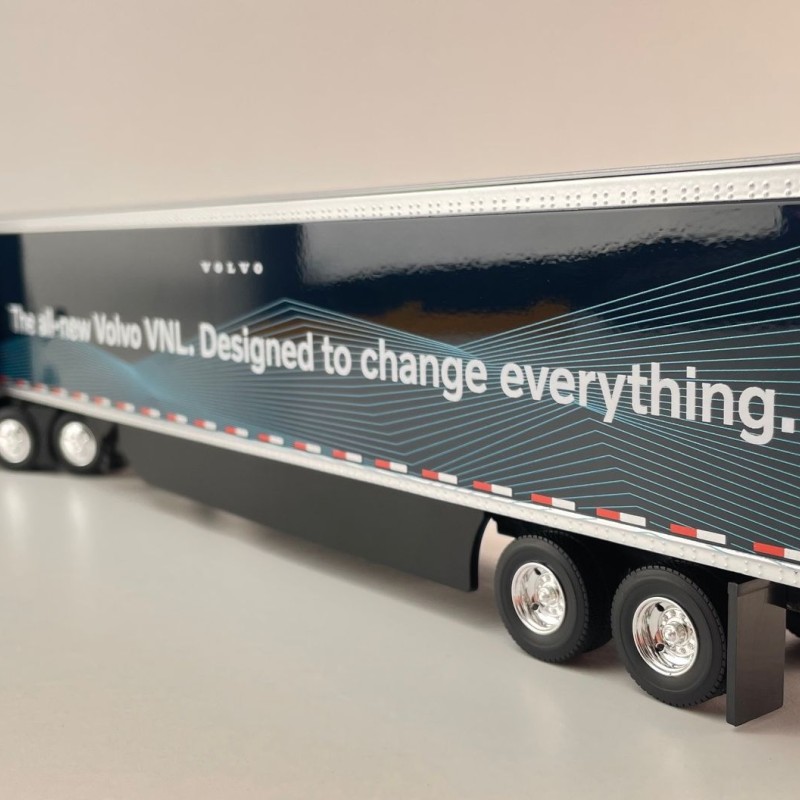 First Gear 50-3502 Volvo VNL 860 High-Roof Sleeper Truck with 53' Trailer with Skirts Coastal Mist 1:50 Scale