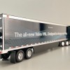 First Gear 50-3502 Volvo VNL 860 High-Roof Sleeper Truck with 53' Trailer with Skirts Coastal Mist 1:50 Scale