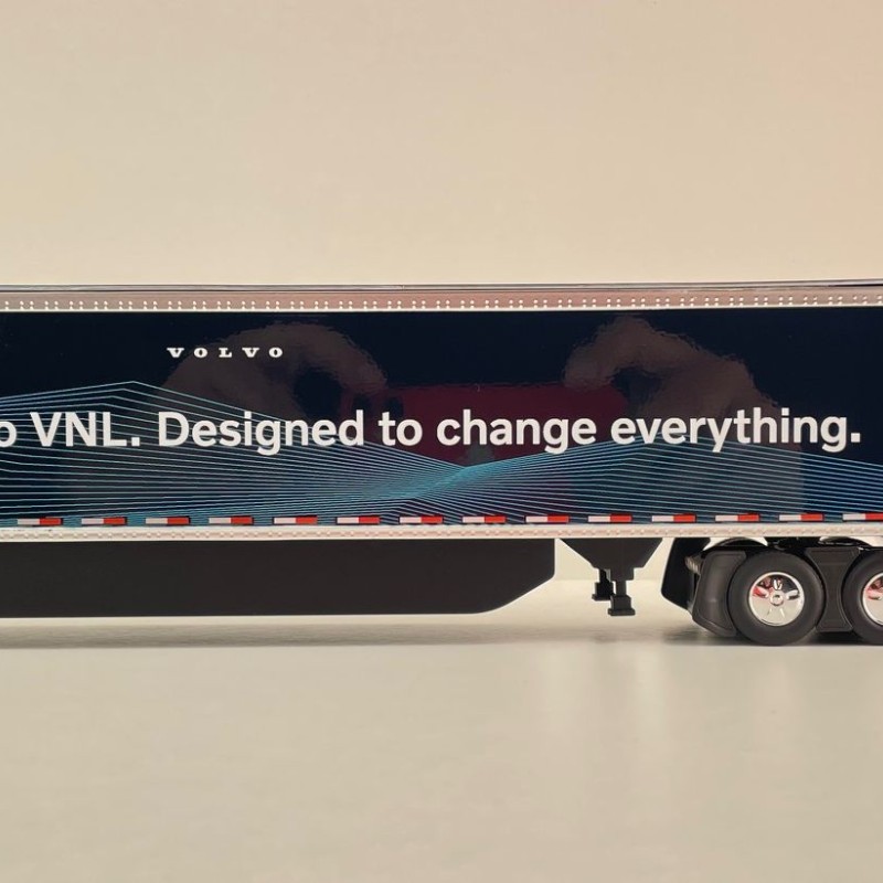 First Gear 50-3502 Volvo VNL 860 High-Roof Sleeper Truck with 53' Trailer with Skirts Coastal Mist 1:50 Scale