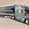 First Gear 50-3502 Volvo VNL 860 High-Roof Sleeper Truck with 53' Trailer with Skirts Coastal Mist 1:50 Scale