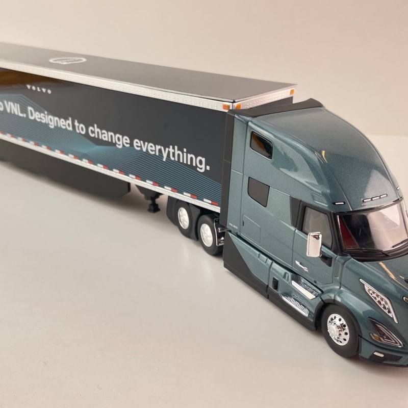 First Gear 50-3502 Volvo VNL 860 High-Roof Sleeper Truck with 53' Trailer with Skirts Coastal Mist 1:50 Scale