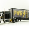 First Gear 69-1064 Peterbilt 389 Truck with Kentucky Moving Trailer - AC/DC: Power/Up Black - Scale 1:64