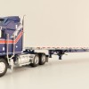 First Gear 69-1657 - Kenworth K100 COE with Aerodyne Sleeper & 53' Wilson Roadbrute Flatbed Trailer Liberty - Scale 1:64