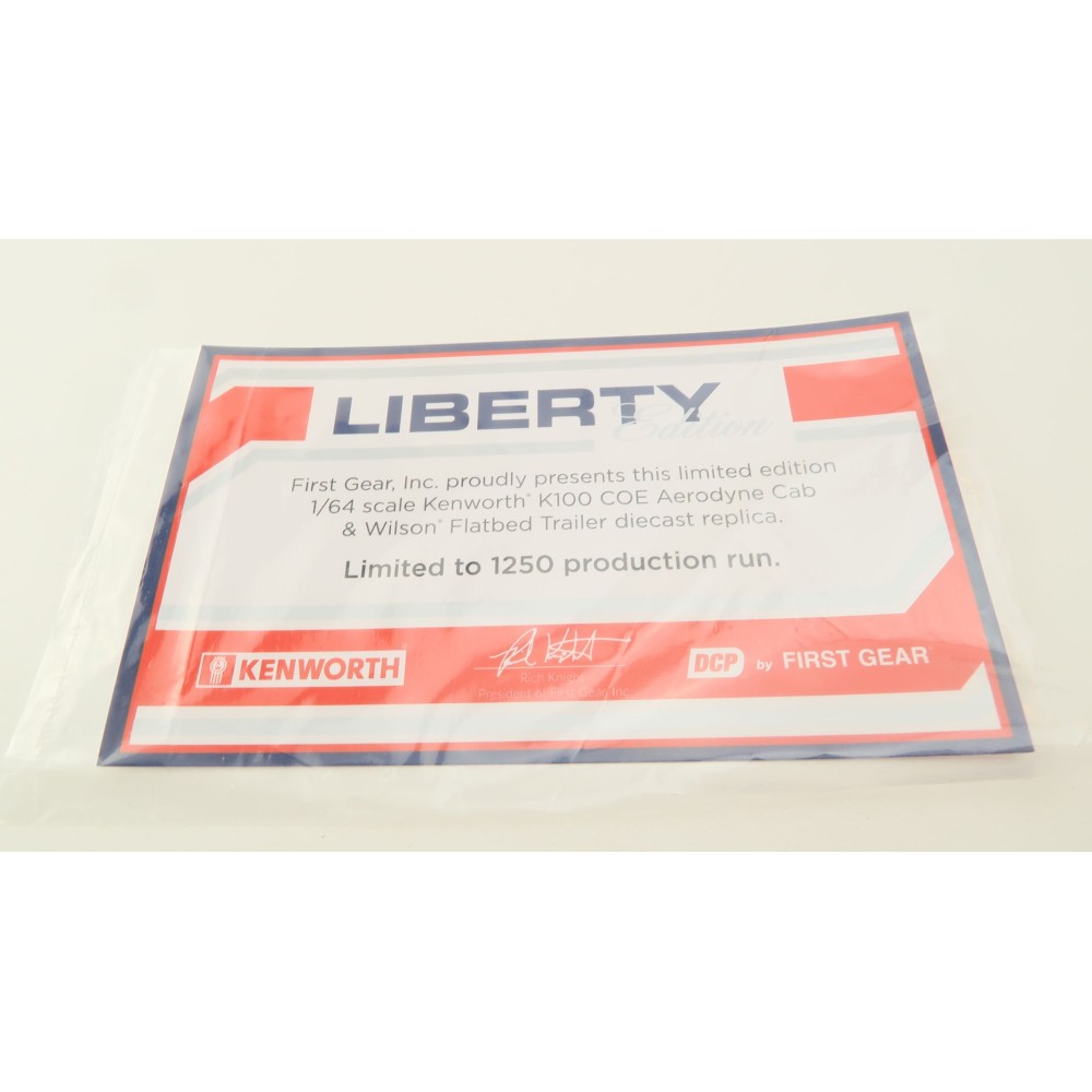 First Gear 69-1657 - Kenworth K100 COE with Aerodyne Sleeper & 53' Wilson Roadbrute Flatbed Trailer Liberty - Scale 1:64