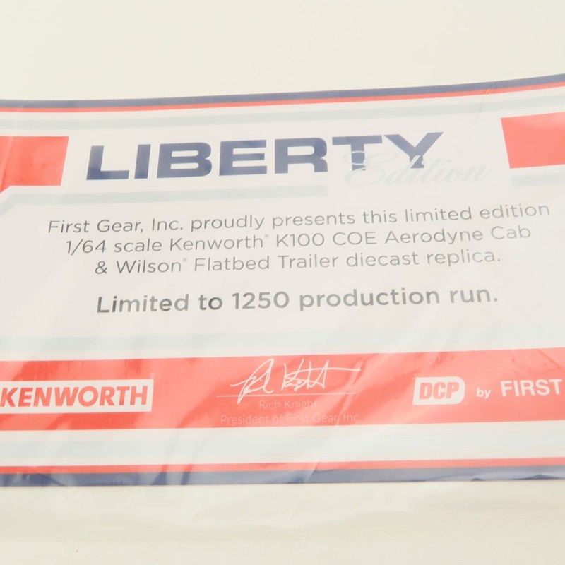 First Gear 69-1657 - Kenworth K100 COE with Aerodyne Sleeper & 53' Wilson Roadbrute Flatbed Trailer Liberty - Scale 1:64