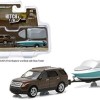 Greenlight 2013 Ford Explorer and Boat with Trailer - Scale 1:64 