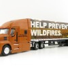 Greenlight 30323 - Mack Anthem 18 Wheeler with Trailer - Smokey Bear - 1:64 Scale