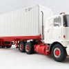 Tekno 72620 - Australian Mack F700 Prime Mover with 3 Axle Trailer and 40 ft Container - Scale 1:50