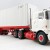 Tekno 72620 - Australian Mack F700 Prime Mover with 3 Axle Trailer and 40 ft Container - Scale 1:50