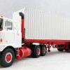 Tekno 72620 - Australian Mack F700 Prime Mover with 3 Axle Trailer and 40 ft Container - Scale 1:50