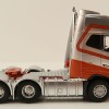 Tekno 83199 - Volvo FH04 Globetrotter XL 6x4 Down Under Silver / Red - Scale 1:50
