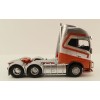 Tekno 83199 - Volvo FH04 Globetrotter XL 6x4 Down Under Silver / Red - Scale 1:50