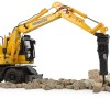 Universal Hobbies UH8163 Komatsu PW180-11 Wheeled Excavator with Bucket and Jackhammer - Scale 1:50