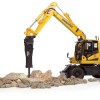 Universal Hobbies UH8163 Komatsu PW180-11 Wheeled Excavator with Bucket and Jackhammer - Scale 1:50